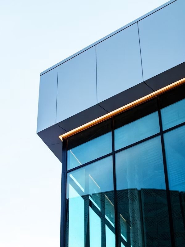 Glass curtain wall and aluminium cladding detail